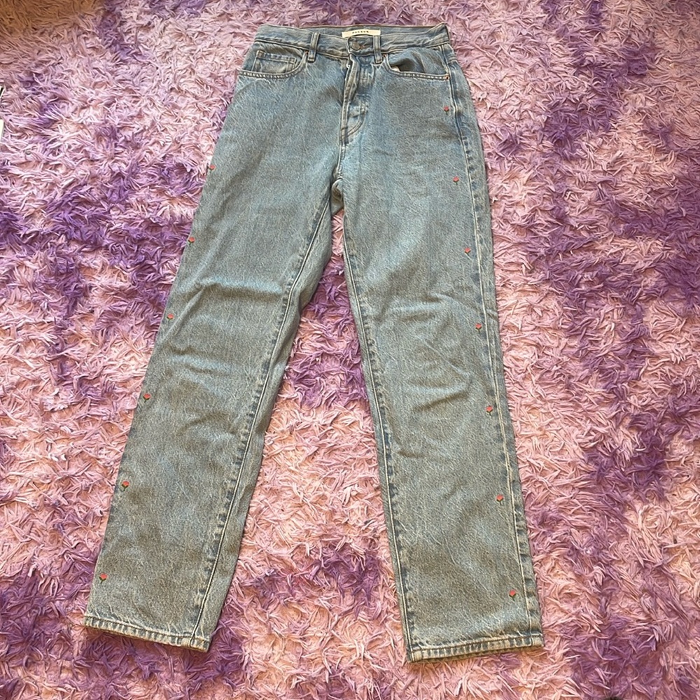 Jeans with tulips on side
